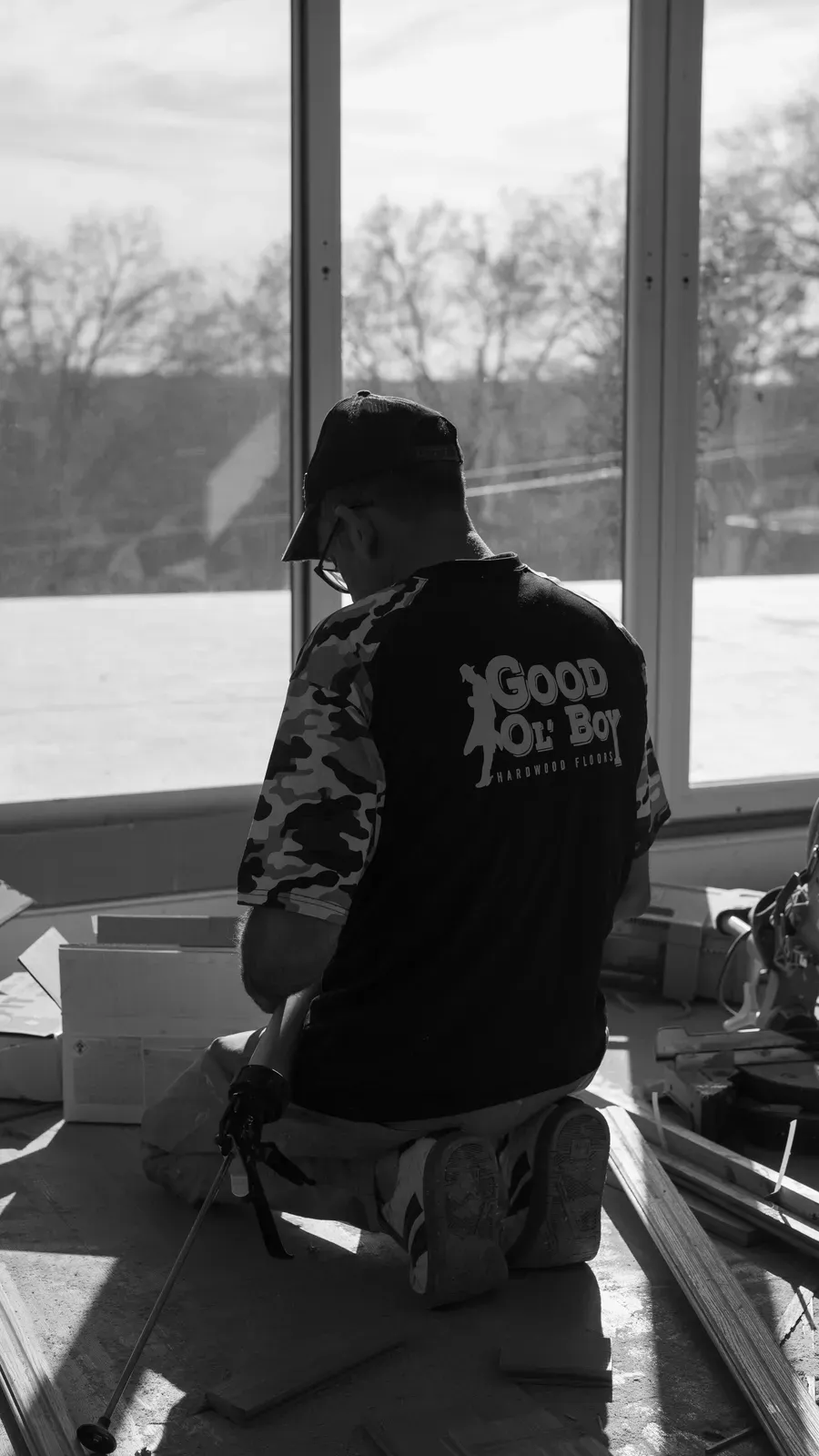 Good Ol’ Boy crew member detailing along a window