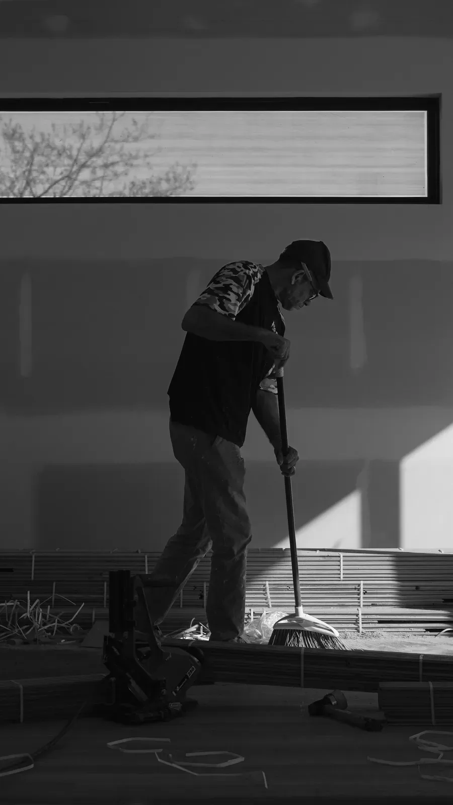 Good Ol’ Boy craftsman cleaning the job site after an install